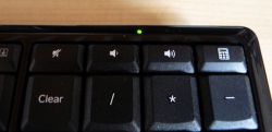 Logitech diNovo : touches supplémentaires et indicateur de batterie